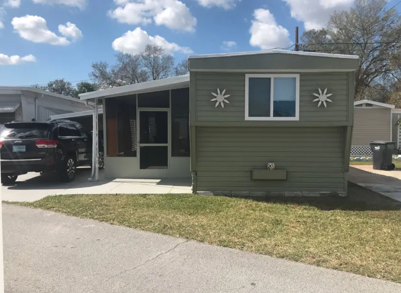 Furnished trailer for sale in a peaceful, pet-free, over-55 community in St. Petersburg, FL